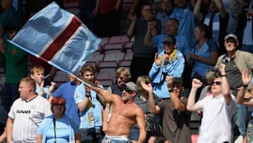 BOURNEMOUTH, ENGLAND - AUGUST 26: Manchester City fans celebrate their sides goal during the Premier League match between AFC Bournemouth and Manchester City at Vitality Stadium on August 26, 2017 in Bournemouth, England. (Photo by Mike Hewitt/Getty Images)