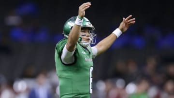 NEW ORLEANS, LA - DECEMBER 16: Mason Fine #6 of the North Texas Mean Green celebrates a touchdown in the first half against the Troy Trojans during the R+L Carriers New Orleans Bowl at the Mercedes-Benz Superdome on December 16, 2017 in New Orleans, Louisiana. (Photo by Jonathan Bachman/Getty Images)