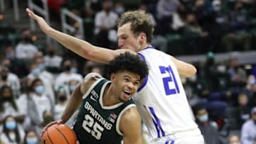 Michigan State forward Malik Hall drives against Grand Valley State forward Marius Grazulis during the first half of their exhibition game on Thursday, Nov. 4, 2021, at the Breslin Center.Msu