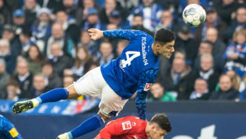 09 November 2019, North Rhine-Westphalia, Gelsenkirchen: Soccer: Bundesliga, FC Schalke 04 - Fortuna Düsseldorf, 11th matchday in the Veltins Arena. Schalkes Ozan Kabak (above) and Dawid Kownacki from Fortuna fight for the ball. Photo: Bernd Thissen/dpa - IMPORTANT NOTE: In accordance with the requirements of the DFL Deutsche Fußball Liga or the DFB Deutscher Fußball-Bund, it is prohibited to use or have used photographs taken in the stadium and/or the match in the form of sequence images and/or video-like photo sequences. (Photo by Bernd Thissen/picture alliance via Getty Images)
