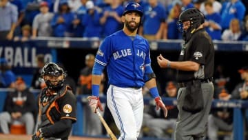 Oct 4, 2016; Toronto, Ontario, CAN; Toronto Blue Jays right fielder Jose Bautista (19) reacts to a called third strike during the ninth inning against the Baltimore Orioles in the American League wild card playoff baseball game at Rogers Centre. Mandatory Credit: Dan Hamilton-USA TODAY Sports