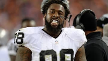 Dec 13, 2015; Denver, CO, USA; Oakland Raiders tight end Clive Walford (88) on the sidelines in the fourth quarter against the Denver Broncos at Sports Authority Field at Mile High. The Raiders defeated Broncos 15-12. Mandatory Credit: Ron Chenoy-USA TODAY Sports
