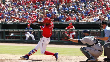 Jun 5, 2016; Arlington, TX, USA; Texas Rangers designated hitter Jurickson Profar (19) drives in a run in the fifth inning against the Seattle Mariners at Globe Life Park in Arlington. Mandatory Credit: Tim Heitman-USA TODAY Sports