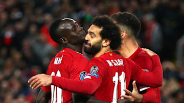 LIVERPOOL, ENGLAND - OCTOBER 02: Mohamed Salah of Liverpool celebrates with Sadio Mane after he scores his sides fourth goal during the UEFA Champions League group E match between Liverpool FC and RB Salzburg at Anfield on October 02, 2019 in Liverpool, United Kingdom. (Photo by Clive Brunskill/Getty Images)