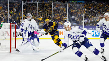 NASHVILLE, TENNESSEE - FEBRUARY 26: Steven Stamkos #91 of the Tampa Bay Lightning skates after the puck after a missed shot on goal in the second period during the 2022 Navy Federal Credit Union NHL Stadium Series between the Tampa Bay Lightning and the Nashville Predators at Nissan Stadium on February 26, 2022 in Nashville, Tennessee. (Photo by Frederick Breedon/Getty Images)