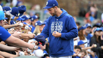 GLENDALE, ARIZONA - MARCH 11: Clayton Kershaw #22 of the Los Angeles Dodgers signs autographs prior to a spring training game against San Francisco Giants at Camelback Ranch on March 11, 2019 in Glendale, Arizona. (Photo by Norm Hall/Getty Images)