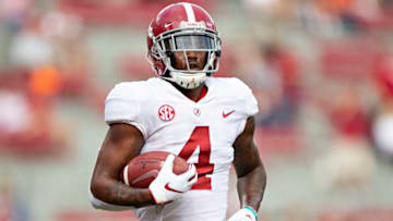 FAYETTEVILLE, AR - OCTOBER 6: Jerry Jeudy #4 of the Alabama Crimson Tide with his team on the field before a game against the Arkansas Razorbacks at Razorback Stadium on October 6, 2018 in Tuscaloosa, Alabama. The Crimson Tide defeated the Razorbacks 65-31. (Photo by Wesley Hitt/Getty Images)