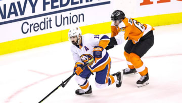 Cal Clutterbuck, New York Islanders and Nicolas Aube-Kubel, Philadelphia Flyers (Photo by Elsa/Getty Images)
