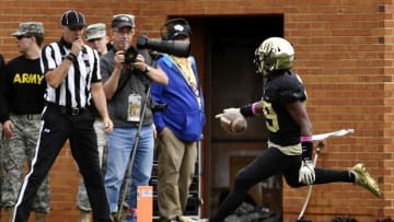 WINSTON SALEM, NC - OCTOBER 28: Wide receiver Greg Dortch #89 of the Wake Forest Demon Deacons runs in a touchdown reception against the Louisville Cardinals late in the first quarter of the football game at BB&T Field on October 28, 2017 in Winston Salem, North Carolina. (Photo by Mike Comer/Getty Images)