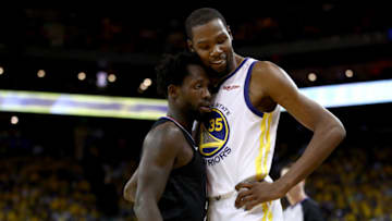 OAKLAND, CALIFORNIA - APRIL 13: Patrick Beverley #21 of the LA Clippers plays tight defense on Kevin Durant #35 of the Golden State Warriors during Game One of the first round of the 2019 NBA Western Conference Playoffs at ORACLE Arena on April 13, 2019 in Oakland, California. Both players were ejected later in the game. NOTE TO USER: User expressly acknowledges and agrees that, by downloading and or using this photograph, User is consenting to the terms and conditions of the Getty Images License Agreement. (Photo by Ezra Shaw/Getty Images)