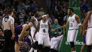 Jan 15, 2016; Boston, MA, USA; Boston Celtics guard Isaiah Thomas (4) and guard Evan Turner (11) react after a play against the Phoenix Suns in the second half at TD Garden. The Celtics defeated the Phoenix Suns 117-103. Mandatory Credit: David Butler II-USA TODAY Sports
