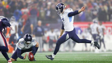 FOXBOROUGH, MASSACHUSETTS - JANUARY 04: Greg Joseph #7 of the Tennessee Titans kicks an extra point against the New England Patriots in the first half of the AFC Wild Card Playoff game at Gillette Stadium on January 04, 2020 in Foxborough, Massachusetts. (Photo by Maddie Meyer/Getty Images)