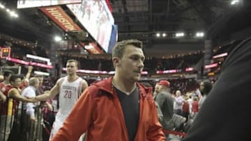 Mar 20, 2014; Houston, TX, USA; Texas A&M quarterback Johnny Manziel shake hands with fans following the fourth quarter of the game between the Minnesota Timberwolves and the Houston Rockets at Toyota Center. Mandatory Credit: Andrew Richardson-USA TODAY Sports