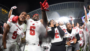 MIAMI GARDENS, FL - DECEMBER 30: Wisconsin Badgers players celebrate winning the 2017 Capital One Orange Bowl against the Miami Hurricanes at Hard Rock Stadium on December 30, 2017 in Miami Gardens, Florida. (Photo by Rob Foldy/Getty Images)