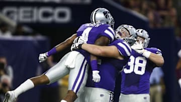 Dec 28, 2016; Houston, TX, USA; Kansas State Wildcats wide receiver Dominique Heath (4) celebrates with offensive lineman Tyler Mitchell (62) after scoring a touchdown during the second quarter against the Texas A&M Aggies at NRG Stadium. Mandatory Credit: Troy Taormina-USA TODAY Sports