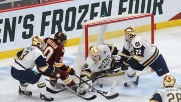 Apr 7, 2018; St. Paul, MN, USA; Notre Dame goalie Cale Morris (32) makes a save during the second period against the Minnesota Duluth Bulldogs in the 2018 Frozen Four college hockey national championship game at Xcel Energy Center. Mandatory Credit: Marilyn Indahl-USA TODAY Sports