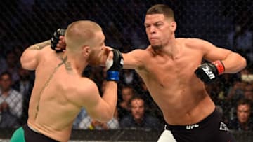 LAS VEGAS, NV - AUGUST 20: (R-L) Nate Diaz punches Conor McGregor of Ireland in their welterweight bout during the UFC 202 event at T-Mobile Arena on August 20, 2016 in Las Vegas, Nevada. (Photo by Josh Hedges/Zuffa LLC/Zuffa LLC via Getty Images)