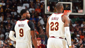 CLEVELAND, OH - OCTOBER 17: Dwyane Wade #9 and LeBron James #23 of the Cleveland Cavaliers walk up court during the game against the Boston Celtics on October 17, 2017 at Quicken Loans Arena in Cleveland, Ohio. NOTE TO USER: User expressly acknowledges and agrees that, by downloading and/or using this Photograph, user is consenting to the terms and conditions of the Getty Images License Agreement. Mandatory Copyright Notice: Copyright 2017 NBAE (Photo by Jesse D. Garrabrant/NBAE via Getty Images)