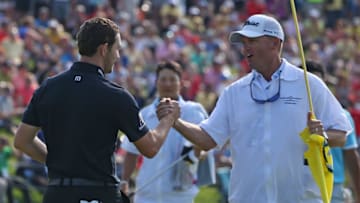 DUBLIN, OHIO - JUNE 02: Patrick Cantlay celebrates with his caddie, Matt Minister, after making a par putt during the final round of The Memorial Tournament Presented by Nationwide at Muirfield Village Golf Club on June 02, 2019 in Dublin, Ohio. (Photo by Matt Sullivan/Getty Images)
