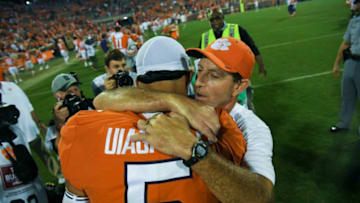 Clemson quarterback D.J. Uiagalelei (5) hugs Clemson head coach Dabo Swinney after their game against Boston College at Memorial Stadium Saturday, Oct. 2, 2021.Kr Clemson 100221 044