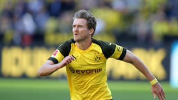 DORTMUND, GERMANY - MAY 05: Andre Schuerrle of Dortmund runs with the ball during the Bundesliga match between Borussia Dortmund and 1. FSV Mainz 05 at Signal Iduna Park on May 5, 2018 in Dortmund, Germany. (Photo by Christof Koepsel/Bongarts/Getty Images)