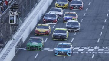 MARTINSVILLE, VIRGINIA - OCTOBER 27: Martin Truex Jr, driver of the #19 Auto Owners Insurance Toyota, leads a pack of cars during the Monster Energy NASCAR Cup Series First Data 500 at Martinsville Speedway on October 27, 2019 in Martinsville, Virginia. (Photo by Brian Lawdermilk/Getty Images)