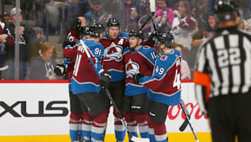 DENVER, CO - NOVEMBER 28: Team members celebrate a second period goal by Colorado Avalanche defenseman Erik Johnson (6) during a regular season game between the Colorado Avalanche and the visiting Pittsburgh Penguins on November 28, 2018 at the Pepsi Center in Denver, CO. (Photo by Russell Lansford/Icon Sportswire via Getty Images)