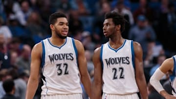 Nov 13, 2016; Minneapolis, MN, USA; Minnesota Timberwolves center Karl-Anthony Towns (32) and guard Andrew Wiggins (22) talk during a time out in the fourth quarter against the Los Angeles Lakers at Target Center. The Minnesota Timberwolves beat the Los Angeles Lakers 125-99. Mandatory Credit: Brad Rempel-USA TODAY Sports