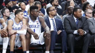 Duke basketball assistant Chris Carrawell, center (Photo by Joe Robbins/Getty Images)