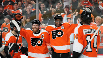 PHILADELPHIA, PA - MARCH 12: Wayne Simmonds #17 of the Philadelphia Flyers celebrates his third period power-play goal against the Vegas Golden Knights with Shayne Gostisbehere #53, Claude Giroux #28, and Sean Couturier #14 on March 12, 2018 at the Wells Fargo Center in Philadelphia, Pennsylvania. (Photo by Len Redkoles/NHLI via Getty Images)