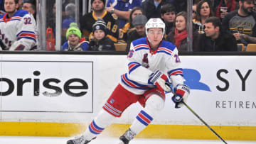 BOSTON, MA - JANUARY 19: New York Rangers Left Wing Jimmy Vesey (26) gets control of the loose puck. During the New York Rangers game against the Boston Bruins on January 19, 2019 at TD Garden in Boston, MA. (Photo by Michael Tureski/Icon Sportswire via Getty Images)