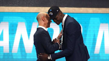 NEW YORK, NY - JUNE 21: Mohamed Bamba poses with NBA Commissioner Adam Silver after being drafted sixth overall by the Orlando Magic during the 2018 NBA Draft at the Barclays Center on June 21, 2018 in the Brooklyn borough of New York City. NOTE TO USER: User expressly acknowledges and agrees that, by downloading and or using this photograph, User is consenting to the terms and conditions of the Getty Images License Agreement. (Photo by Mike Stobe/Getty Images)