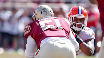 TALLAHASSEE, FL - OCTOBER 27: Defensive Tackle Christian Wilkins #42 of the Clemson Tigers is blocked by Center Baveon Johnson #51 of the Florida State Seminoles during the game at Doak Campbell Stadium on Bobby Bowden Field on October 27, 2018 in Tallahassee, Florida. The #2 Ranked Clemson Tigers defeated the Florida State Seminoles 59 to 10. (Photo by Don Juan Moore/Getty Images)