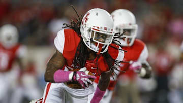 Oct 17, 2014; Houston, TX, USA; Houston Cougars defensive back Trevon Stewart (23) returns an interception for a touchdown during the first quarter against the Temple Owls at TDECU. Mandatory Credit: Troy Taormina-USA TODAY Sports