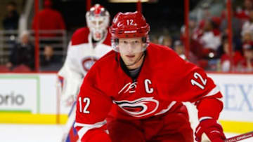 Dec 5, 2015; Raleigh, NC, USA; Carolina Hurricanes forward Eric Staal (12) watches the play against the Carolina Hurricanes at PNC Arena. The Carolina Hurricanes defeated the Montreal Canadiens 3-2. Mandatory Credit: James Guillory-USA TODAY Sports