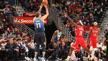NEW ORLEANS, LA - DECEMBER 3: Luka Doncic #77 of the Dallas Mavericks shoots the ball against the New Orleans Pelicans on December 3, 2019 at the Smoothie King Center in New Orleans, Louisiana. NOTE TO USER: User expressly acknowledges and agrees that, by downloading and or using this Photograph, user is consenting to the terms and conditions of the Getty Images License Agreement. Mandatory Copyright Notice: Copyright 2019 NBAE (Photo by Layne Murdoch Jr./NBAE via Getty Images)