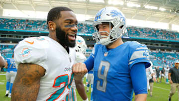 MIAMI, FL - OCTOBER 21: Matthew Stafford #9 of the Detroit Lions talks with Xavien Howard #25 of the Miami Dolphins after the game at Hard Rock Stadium on October 21, 2018 in Miami, Florida. (Photo by Michael Reaves/Getty Images)
