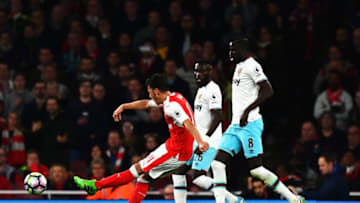 LONDON, ENGLAND - APRIL 05: Mesut Ozil of Arsenal scores his sides first goal during the Premier League match between Arsenal and West Ham United at the Emirates Stadium on April 5, 2017 in London, England. (Photo by Dan Mullan/Getty Images)