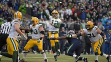 Jan 18, 2015; Seattle, WA, USA; Green Bay Packers quarterback Aaron Rodgers (12) throws the ball to Jordy Nelson (87) against the Seattle Seahawks in the NFC Championship Game at CenturyLink Field. Mandatory Credit: Kirby Lee-USA TODAY Sports