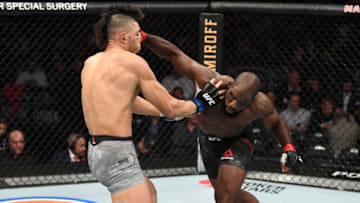 NEW YORK, NEW YORK - NOVEMBER 02: (R-L) Corey Anderson punches Johnny Walker of Brazil in their light heavyweight bout during the UFC 244 event at Madison Square Garden on November 02, 2019 in New York City. (Photo by Josh Hedges/Zuffa LLC via Getty Images)