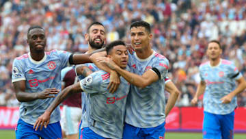 LONDON, ENGLAND - SEPTEMBER 19: Jesse Lingard of Manchester United celebrates scoring his side's second goal with team mate Cristiano Ronaldo during the Premier League match between West Ham United and Manchester United at London Stadium on September 19, 2021 in London, England. (Photo by Craig Mercer/MB Media/Getty Images)