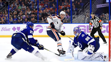 TAMPA, FL - NOVEMBER 06: Andrei Vasilevskiy #88 of the Tampa Bay Lightning stops a shot from Connor McDavid #97 of the Edmonton Oilers during a game at Amalie Arena on November 6, 2018 in Tampa, Florida. (Photo by Mike Ehrmann/Getty Images)