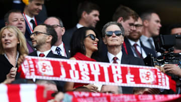 LIVERPOOL, ENGLAND - MAY 21: John W. Henry, Liverpool owner and his wife Linda Pizzuti Henry look on during the Premier League match between Liverpool and Middlesbrough at Anfield on May 21, 2017 in Liverpool, England. (Photo by Jan Kruger/Getty Images)