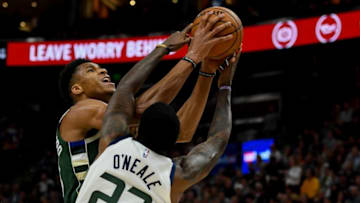 Giannis Antetokounmpo, Milwaukee Bucks. Royce O'Neale, Utah Jazz. (Photo by Alex Goodlett/Getty Images)