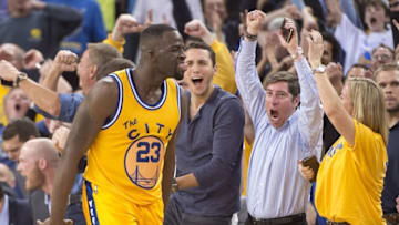 March 1, 2016; Oakland, CA, USA; Golden State Warriors forward Draymond Green (23) celebrates after making a three-point basket against the Atlanta Hawks during overtime at Oracle Arena. The Warriors defeated the Hawks 109-105 in overtime. Mandatory Credit: Kyle Terada-USA TODAY Sports