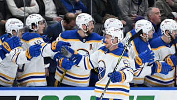 Apr 12, 2022; Toronto, Ontario, CAN; Buffalo Sabres forward Jeff Skinner (53) celebrates with team mates after scoring a goal againts the Toronto Maple Leafs in the third period at Scotiabank Arena. Mandatory Credit: Dan Hamilton-USA TODAY Sports