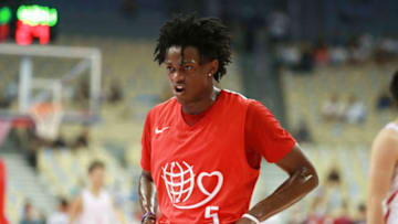 DALIAN, CHINA - AUGUST 12: De'Aaron Fox of American Professional Nike Rising Star Team in action against Chinese Men's Basketball Stars Team during 2018 Yao Foundation Charity Game at Dalian Sports Center on August 12, 2018 in Dalian, Liaoning Province of China. (Photo by VCG)
