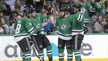 Nov 3, 2016; Dallas, TX, USA; Dallas Stars right wing Patrick Eaves (18) and left wing Jamie Benn (14) and center Tyler Seguin (91) and defenseman Stephen Johns (28) celebrate a goal against St. Louis Blues during the second period at the American Airlines Center. Mandatory Credit: Jerome Miron-USA TODAY Sports