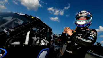 ROSSBURG, OH - JULY 19: Brandon Hightower, driver of the #1 Chevrolet, gets into his truck during qualifying for the NASCAR Camping World Truck Series 5th Annual Dirt Derby 150 at Eldora Speedway on July 19, 2017 in Rossburg, Ohio. (Photo by Sean Gardner/Getty Images)