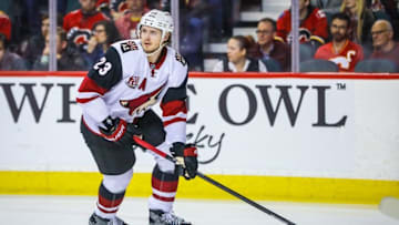 Nov 16, 2016; Calgary, Alberta, CAN; Arizona Coyotes defenseman Oliver Ekman-Larsson (23) skates with the puck against the Calgary Flames during the first period at Scotiabank Saddledome. Mandatory Credit: Sergei Belski-USA TODAY Sports